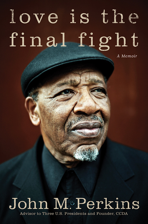 The book cover of Love Is The Final Fight by John Perkins.  Photo by John Keatley.