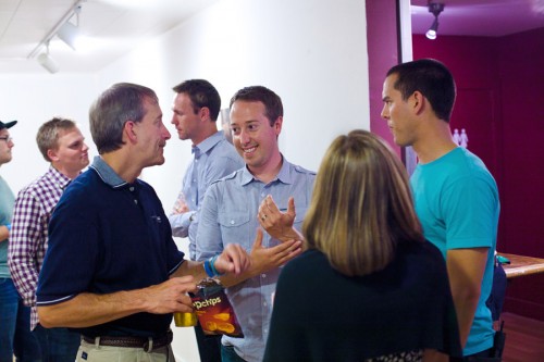 Talking to people in the gallery.