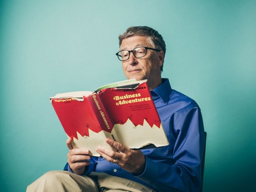 Portrait of Bill Gates with Business Adventures. By photographer John Keatley.
