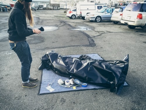 The body bag getting stuffed